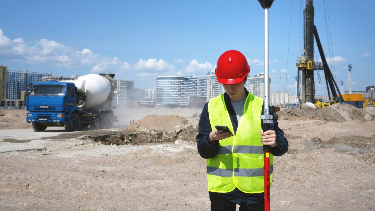 Landmeter aan het werk